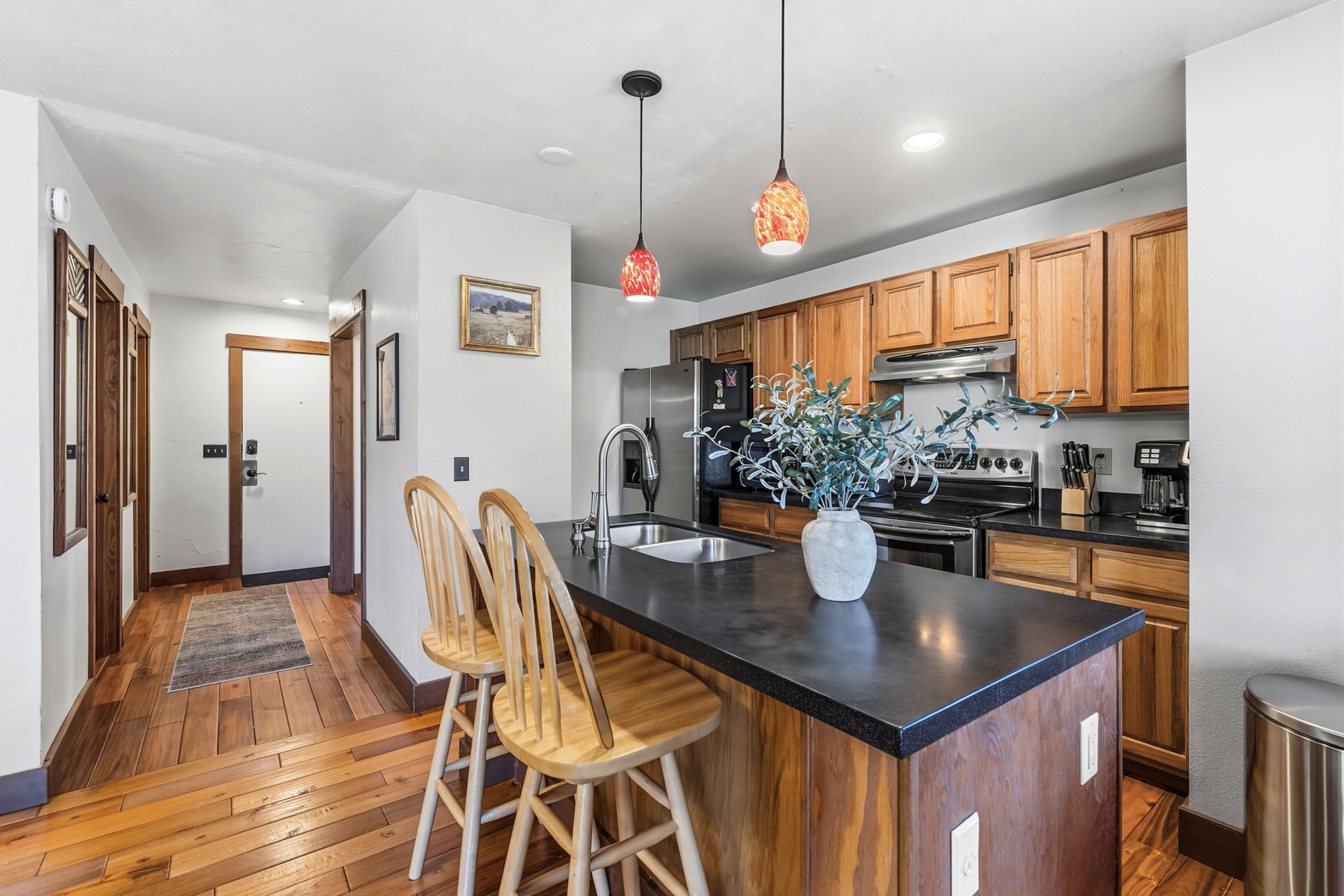 Kitchen island and warm wood finishes